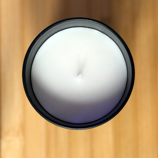 Hand-poured red berry rose candle jar close up UK