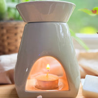 Sage green ceramic wax melt warmer by Heartman Fragrances