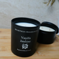 Hand-poured Vanilla & Jasmine candle in matt black glass jar by Heartman Fragrances